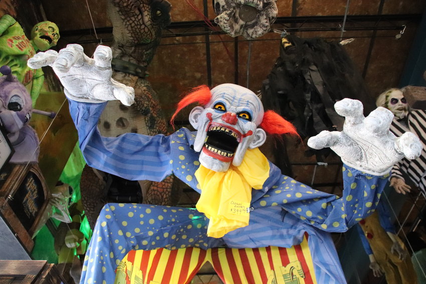 A monstrous clown welcomes visitors to Reinke Bros in downtown Littleton.